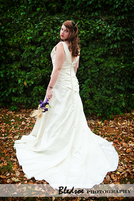 "Bride in her wedding dress"