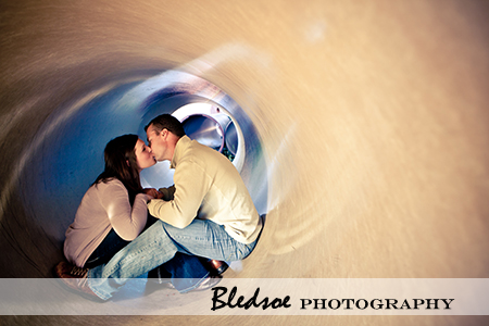 "Amy and Scott inside a drainpipe at UT Gardens"